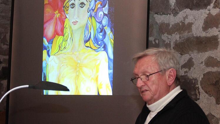 Dieter Gropp las Verse zu den Bildern, die an die Leinwand geworfen wurden. Fotos: Johanna Blum