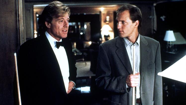 Davids (Woody Harrelson, rechts) und John (Robert Redford) treiben ein unmoralisches Spiel: eine Million Dollar f&uuml;r eine Nacht mit der Ehefrau des anderen.