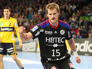 Christoph Nienhaus und dem HC Erlangen gelang ein phänomenaler 27:25-Sieg gegen die Rhein-Neckar Löwen.  Fotos: Sportfoto Zink