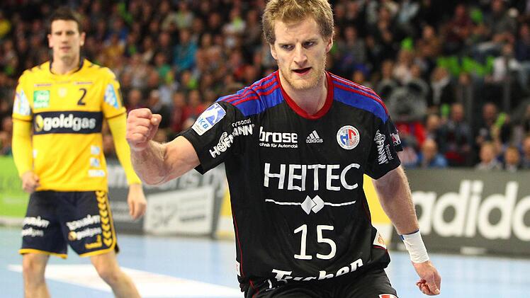 Christoph Nienhaus und dem HC Erlangen gelang ein phänomenaler 27:25-Sieg gegen die Rhein-Neckar Löwen.  Fotos: Sportfoto Zink