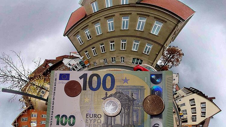 Eine runde Sache ist die Finanzlage der Marktgemeinde Maßbach.  Nun wurde der Haushalt einstimmig im Rathaus (oben) verabschiedet. Foto/Montage: Dieter Britz