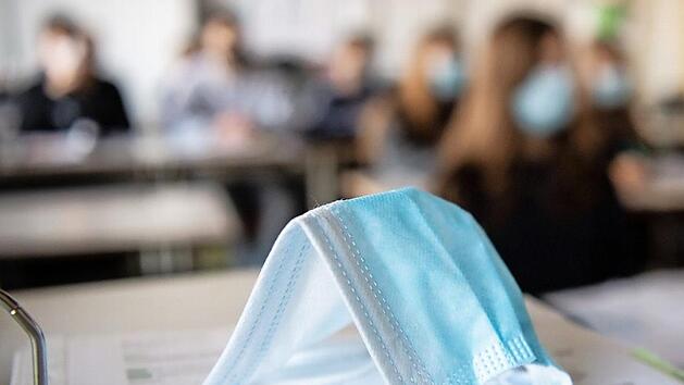 Masken werden so manche Schulklasse noch eine Weile begleiten.