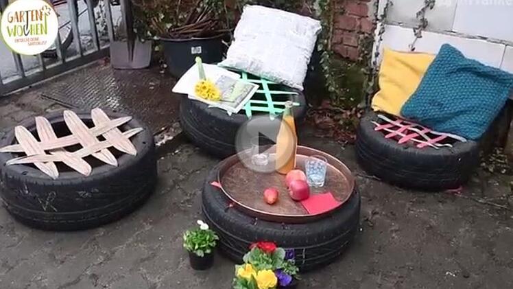 Sitzgelegenheiten für den Garten - in unserem Video zeigen wir, wie man aus Autoreifen günstig und einfach Hocker für draußen bauen kann. Foto: Screenshot / Ronald Rinklef