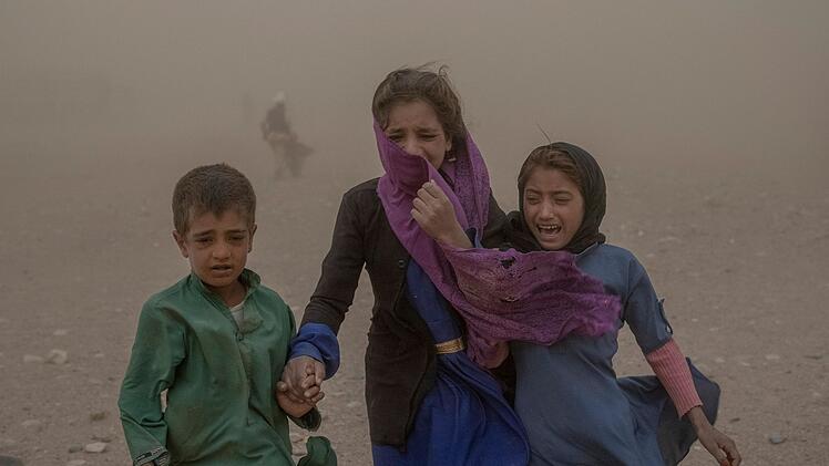 Afghanische Mutter mit Kindern