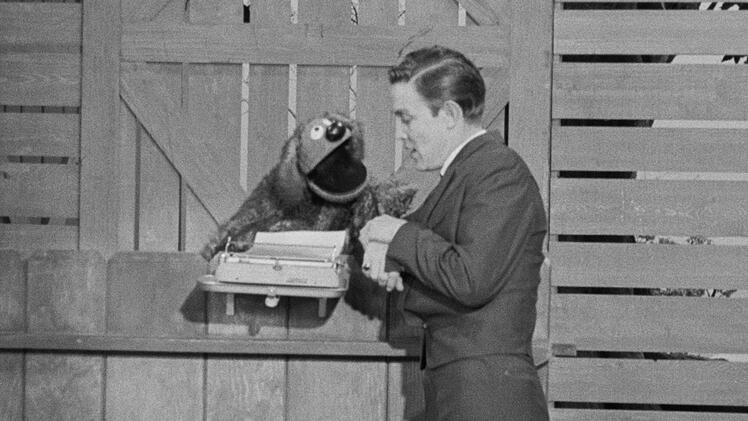 Miss Piggy und Kermit m&ouml;gen zwar die bekanntesten Muppets sein, waren aber nicht die ersten Vertreter ihrer Zunft. Stattdessen steht der Hund Rowlf am Beginn eines weltweiten Siegeszuges.