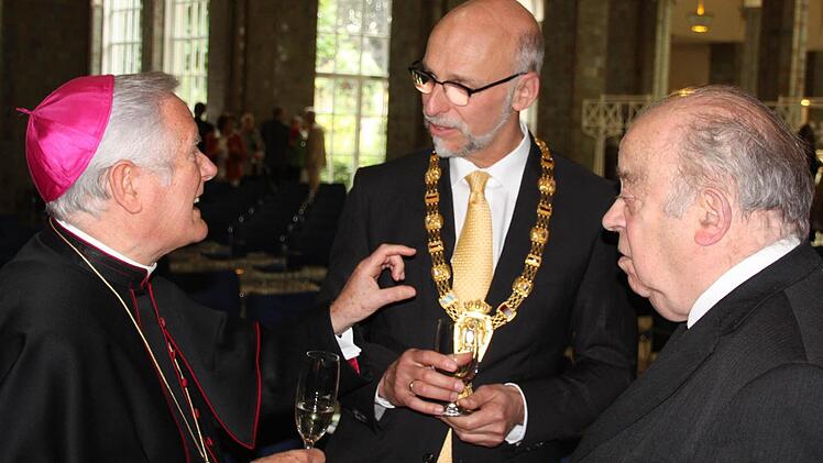 Bischof Friedhelm Hofmann, OB Kay Blankenburg und Bischof emer. Paul Werner Schele (von links).