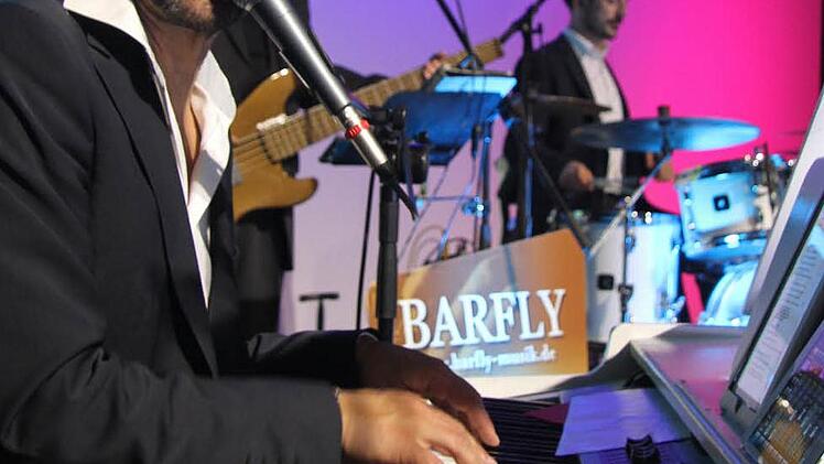 Die Gruppe "Barfly" sorgt für Stimmung. Foto: Sonja Adam