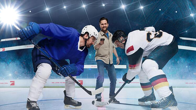 Matthias Killing (Mitte) klemmt sich hinter den Puck.