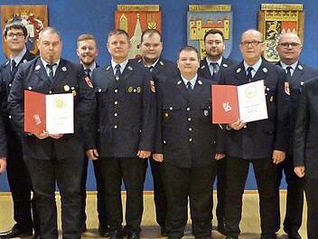 Die Geehrten und neuen Vorstandsmitglieder der Feuerwehr Marktleugast Foto: Klaus-Peter Wulf