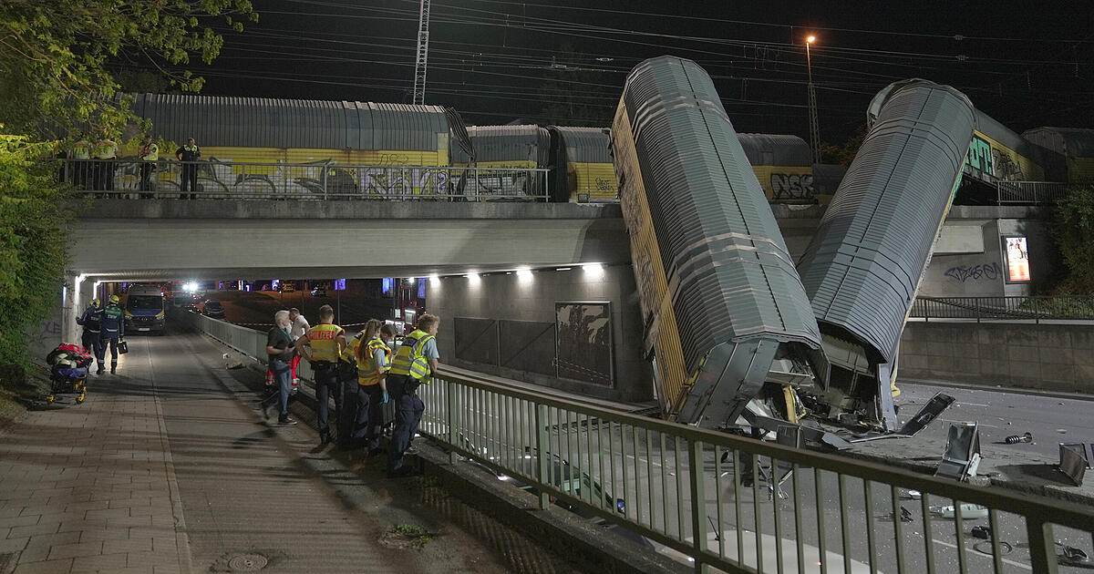 Munich: Two freight train wagons fall from bridge - | one person ...