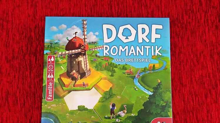 Spiele-Test Dorfromantik - das Brettspiel:  Entspannter Landschaftsbau mit Sogwirkung