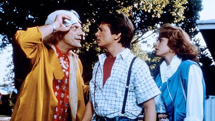 "Zur&uuml;ck in die Zukunft", die Trilogie um den Zeitmaschinenerfinder "Doc" Brown und Teenager Marty McFly, machte Michael J. Fox (Mitte) und Christopher Lloyd zu Stars.