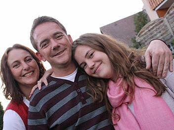 Caroline Mayer-Nuss, Alexander Nuss und Tochter Fiona.