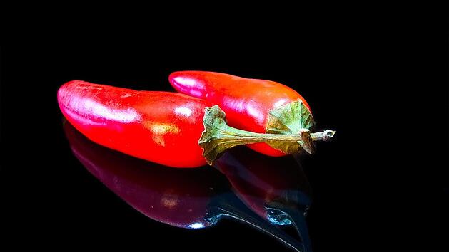 Studien weisen positive Wirkungen von Chilis nach.