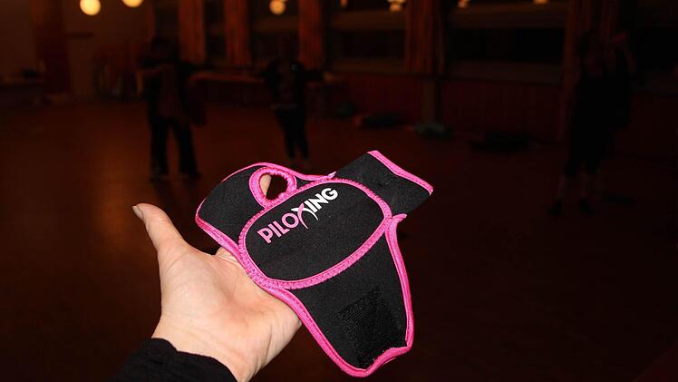 Handlanger: Gewichte im Handschuh sorgen für Muskelaufbau.