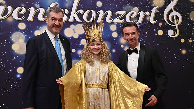 Markus S&ouml;der (links) und Florian Silbereisen feierten 2025 ein "Adventskonzert" mit dem N&uuml;rnberger Christkind.