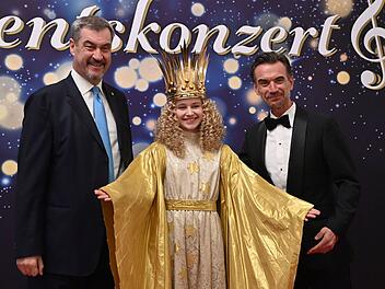 Markus S&ouml;der (links) und Florian Silbereisen feierten 2025 ein "Adventskonzert" mit dem N&uuml;rnberger Christkind.