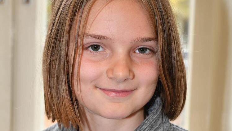 Ida (9) war mit ihrer Freundin Antonia zum ersten Mal in der Kinder-Uni. "Es ist schöner, wenn man eine Freundin dabei hat, wenn man irgendwo neu hingeht." Foto: Ronald Rinklef