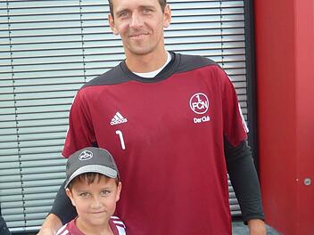 Max Greubel mit seinem Superstar Raphael Schäfer Foto: Greubel
