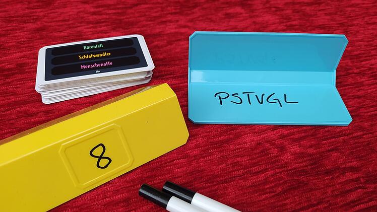 Spiele-Test Less is More: Rezension des kreativen Party-Wortspiels