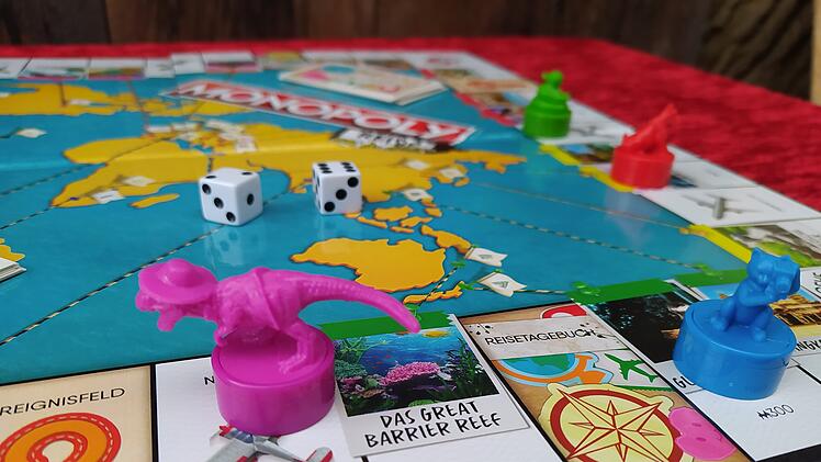 Spiele-Test Monopoly - Reise um die Welt: So spielt sich die Urlaubs-Variante des Brettspiel-Klassikers