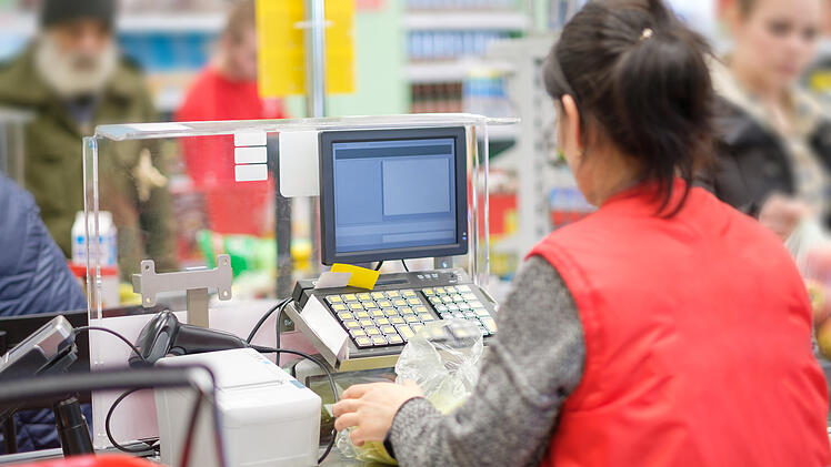 Kassiererin, Supermarkt, Kasse, Minijob, Mindestlohn