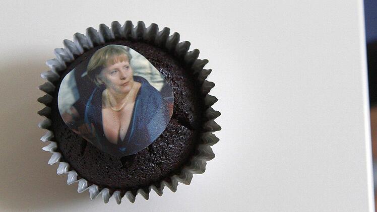 Kanzlerin-Versuchung: Dieser Muffin wurde an Zaungäste verteilt.