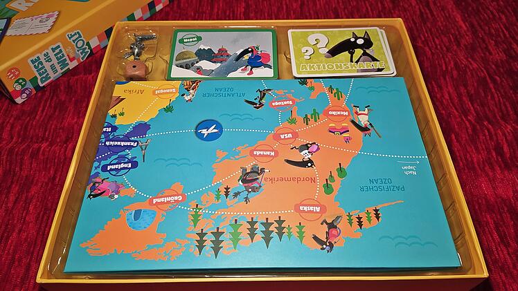 Reise um die Welt mit Wolf - Rezension des Postkarten-Brettspiels für Kinder