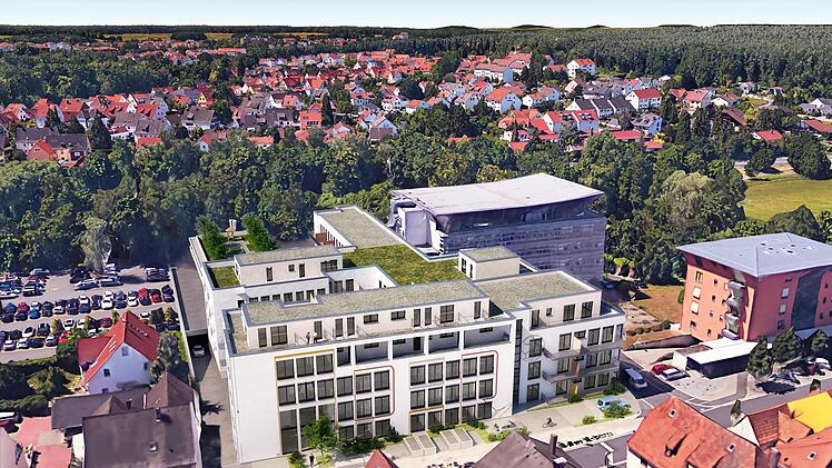 In den Altbau (Bildmitte) werden 99 Wohnungen eingebaut. Für den versetzten Neubau (rechts im Hintergrund) steht die Nutzung noch nicht fest.  Visualisierung: P&P