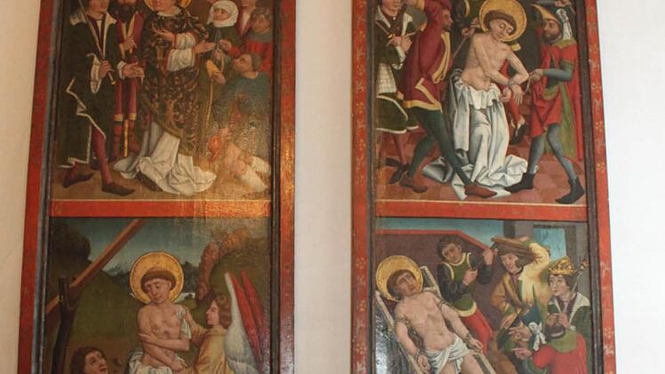 Die Laurentius-Geschichte, dargestellt auf Standflügeln, die in der Sakristei aufbewahrt werden. Foto: Alexander Hartmann