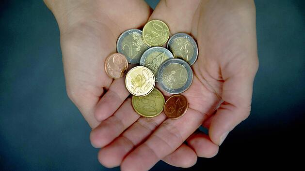 Der gesetzliche Mindestlohn in Deutschland steigt Anfang 2017 auf 8,84&nbsp;Euro. Foto: Arno Burgi/dpa