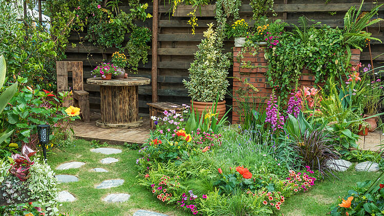 Landscaped backyard flower garden of residential house