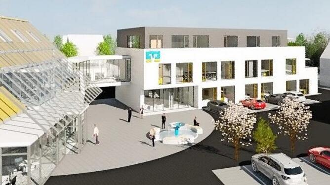 Die Hauptstelle der Raiffeisenbank Altenkunstadt muss aus Platzgründen erweitert werden. Der Altbau (links) wird über eine Verbindungsbrücke mit dem dreigeschossigen Neubau verbunden. Im Spätsommer soll der Spatenstich für die 3,6 Millionen Euro teure Baumaßnahme erfolgen.  Foto: Stephan Stöckel