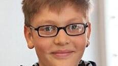 Jens ist fast immer in der Kinder-Uni. "Super ist, dass die Professoren die Themen so erklären, dass sie auch wir Kinder verstehen. Aber heute hat mich das Thema nicht so interessiert. Ich hätte lieber etwas über die Steinzeit erfahren." Foto: Barbara Herbst
