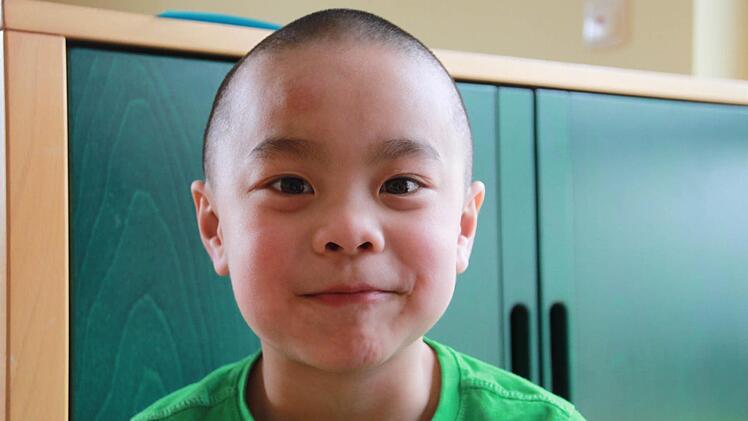 Tim: Ich bin glücklich, dass ich ein Zuhause habe. Viele Kinder haben keines. Foto: Anja Greiner