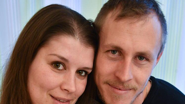 Miron mit seinen Eltern Alena und Eugen Knaub. Foto: Ronald Rinklef