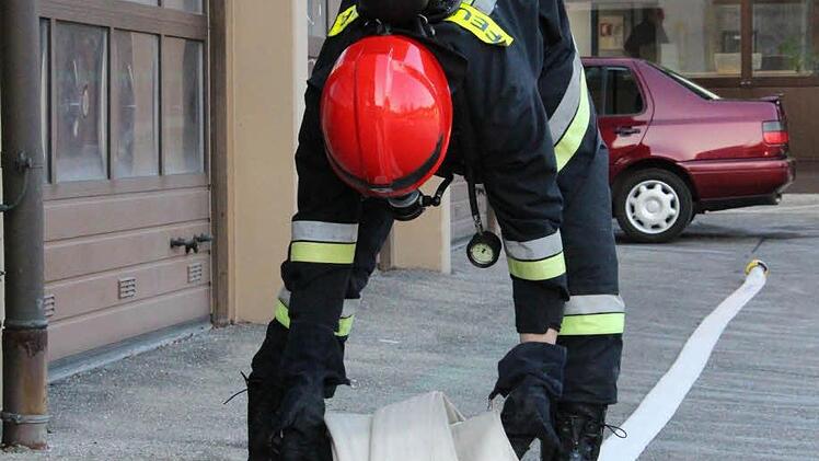 Schläuche zusammenrollen gehört ebenfalls zum Wettkampf.