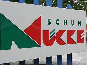 Firmenschild Schuh Mücke Foto: Hänseler