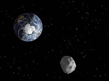 So könnte es aussehen, wenn der Asteroid an der Erde vorbeifliegt. Foto: dpa/Nasa