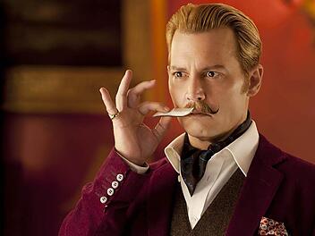 Johnny Depp spielt die Titelrolle in "Mortdecai - Der Teilzeitganove". Der Streifen kommt am 22. Januar ins Kino.  Foto: Studiocanal/David Appleby