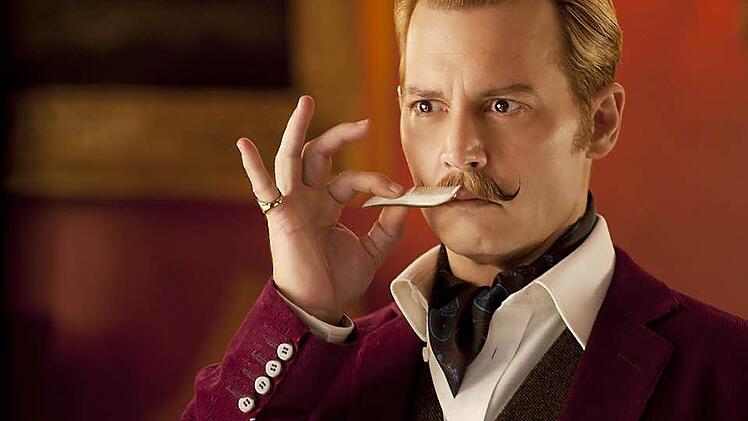 Johnny Depp spielt die Titelrolle in "Mortdecai - Der Teilzeitganove". Der Streifen kommt am 22. Januar ins Kino.  Foto: Studiocanal/David Appleby