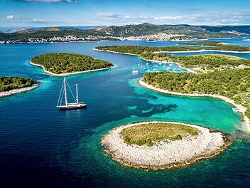 Aerial view of Paklinski Islands in Hvar, Croatia. Turquise water bays with luxury yachts and sailing boats. Toned image.  Luftaufnahme der Paklinski-Inseln in Hvar, Kroatien.