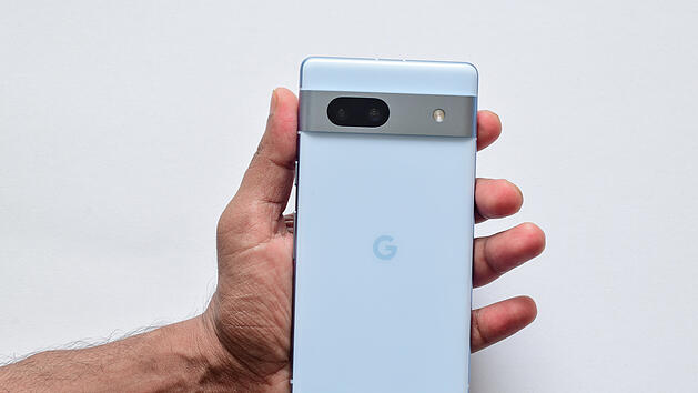 Man holding Google Pixel 7A smartphone. Taoyuan, Taiwan - 6th August, 2023.