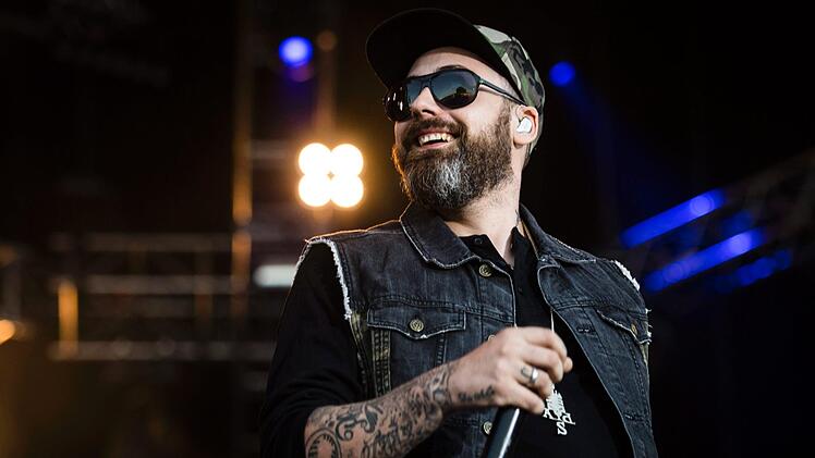 Am 24. August 2022 wird der Berliner Rapper Sido auf dem Schlossplatz des Coburger Schlosses Ehrenburg auftreten. Alle Informationen zur Tour & den Tickets gibt es hier. Foto: Gian Ehrenzeller/KEYSTONE/dpa