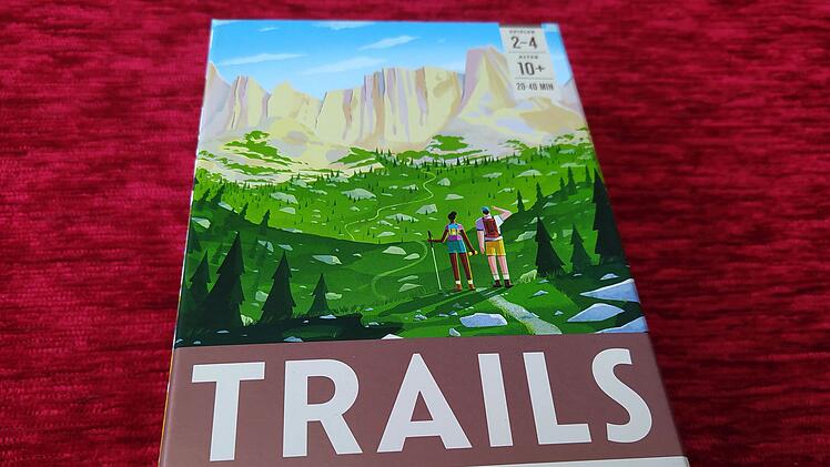 Spiele-Test Trails: Rezension des kompakten Familienspiels rund ums Wandern