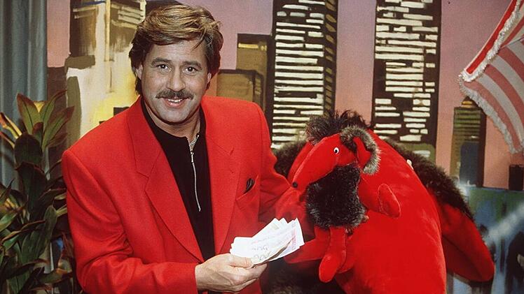 Die drei Hauptdarsteller der Kult-Sendung "Geh aufs Ganze!": Moderator Jörg Draeger, der Zonk und Bargeld.