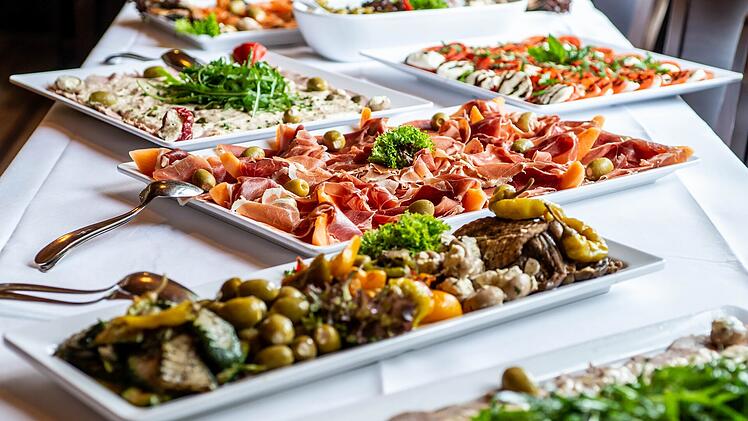 Party Brunch big Buffet table setting with Food Meat Vegetables