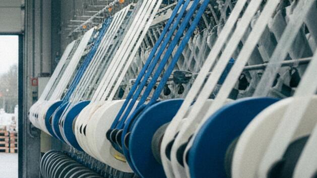 Produktionsstandort eines Textilunternehmens. In der Fertigung werden unter anderem Garne hergestellt.