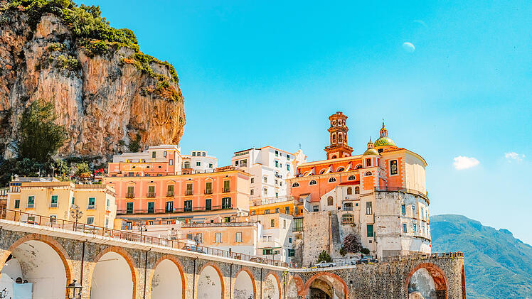 Atrani famous coastline in southern Italy, vertiginous cliffs adorned with colorful villages, turquoise waters. Small town Atrani on Amalfi Coast in province of Salerno, Campania region, Italy