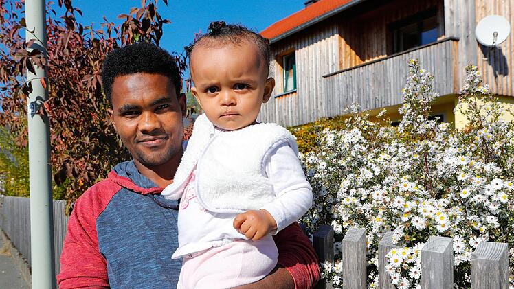 Kadir Zenu Husen mit Tochter
